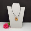Pendentif triangle escargot