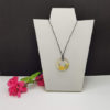 Pendentif en résine et jardin