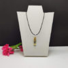 Pendentif en résine et jardin